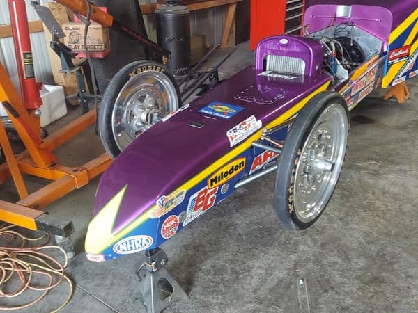 Purple NHRA competition dragster